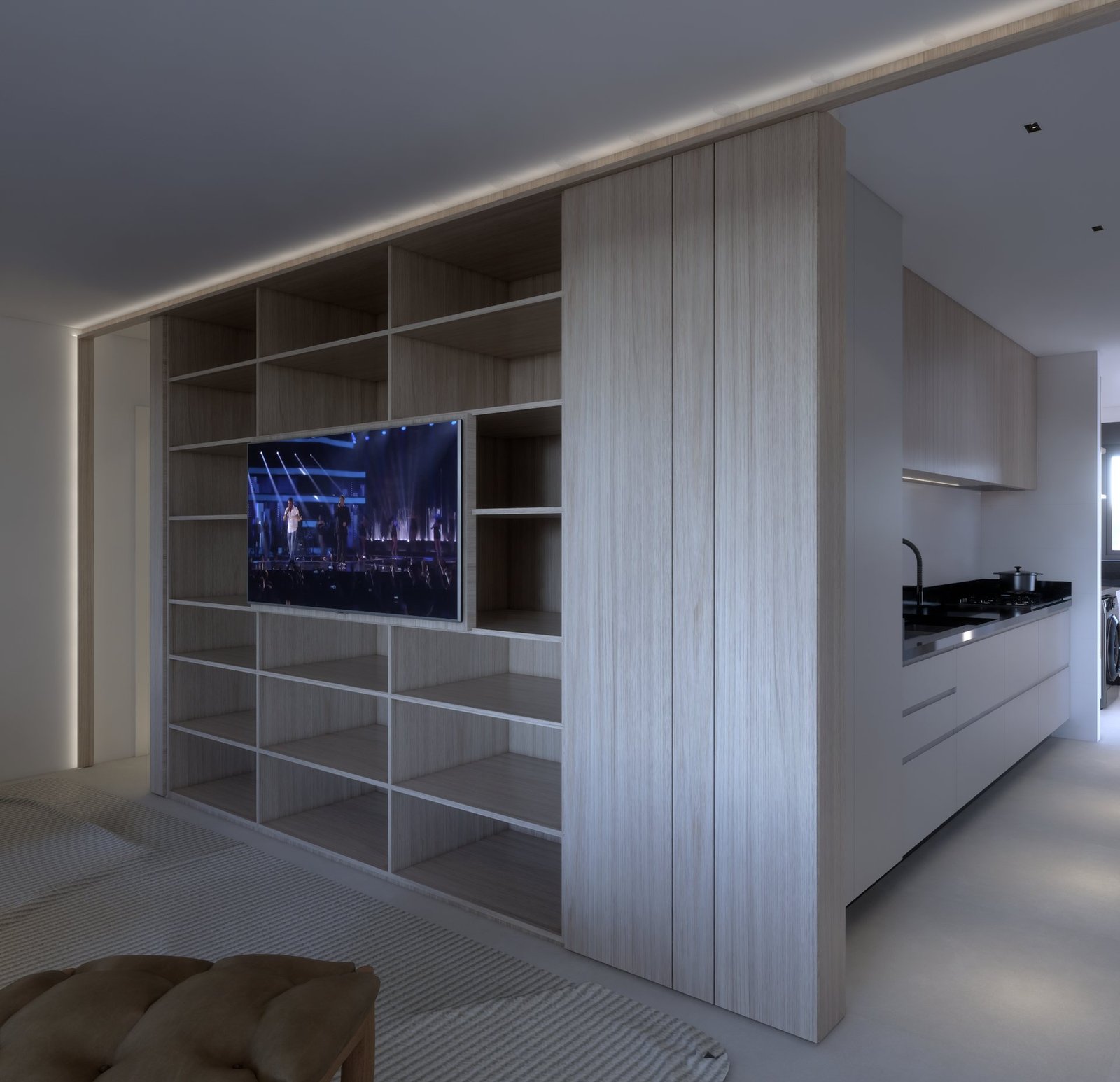 Apartamento MC — Presidente Prudente: estante modulada aberta com TV, cozinha ao fundo — projeto de arquitetura de interiores