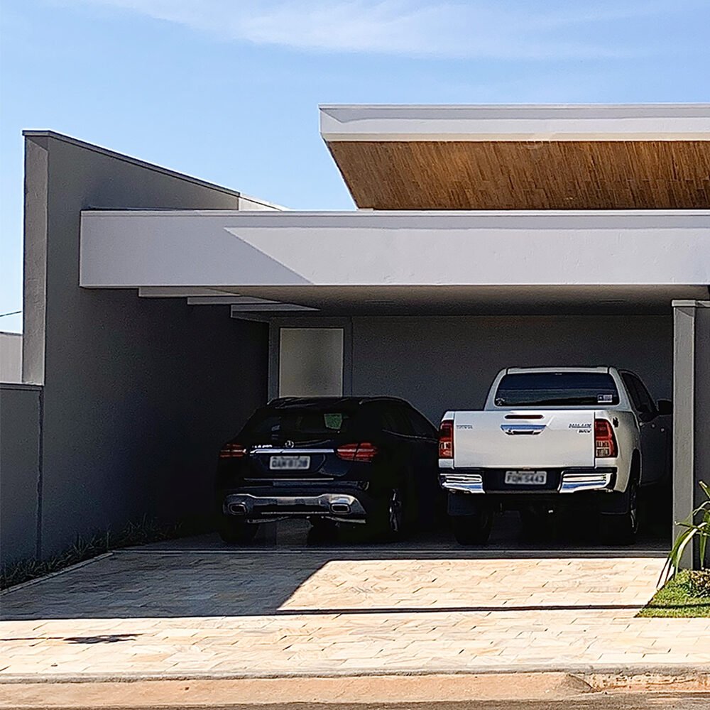 Casa BH — Osvaldo Cruz: garagem carros real — projeto de arquitetura residencial