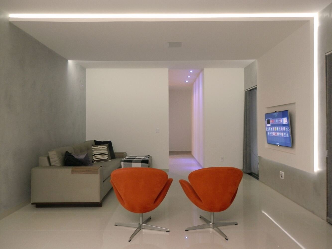 Casa MJ — Adamantina: sala estar poltronas — projeto de arquitetura residencial