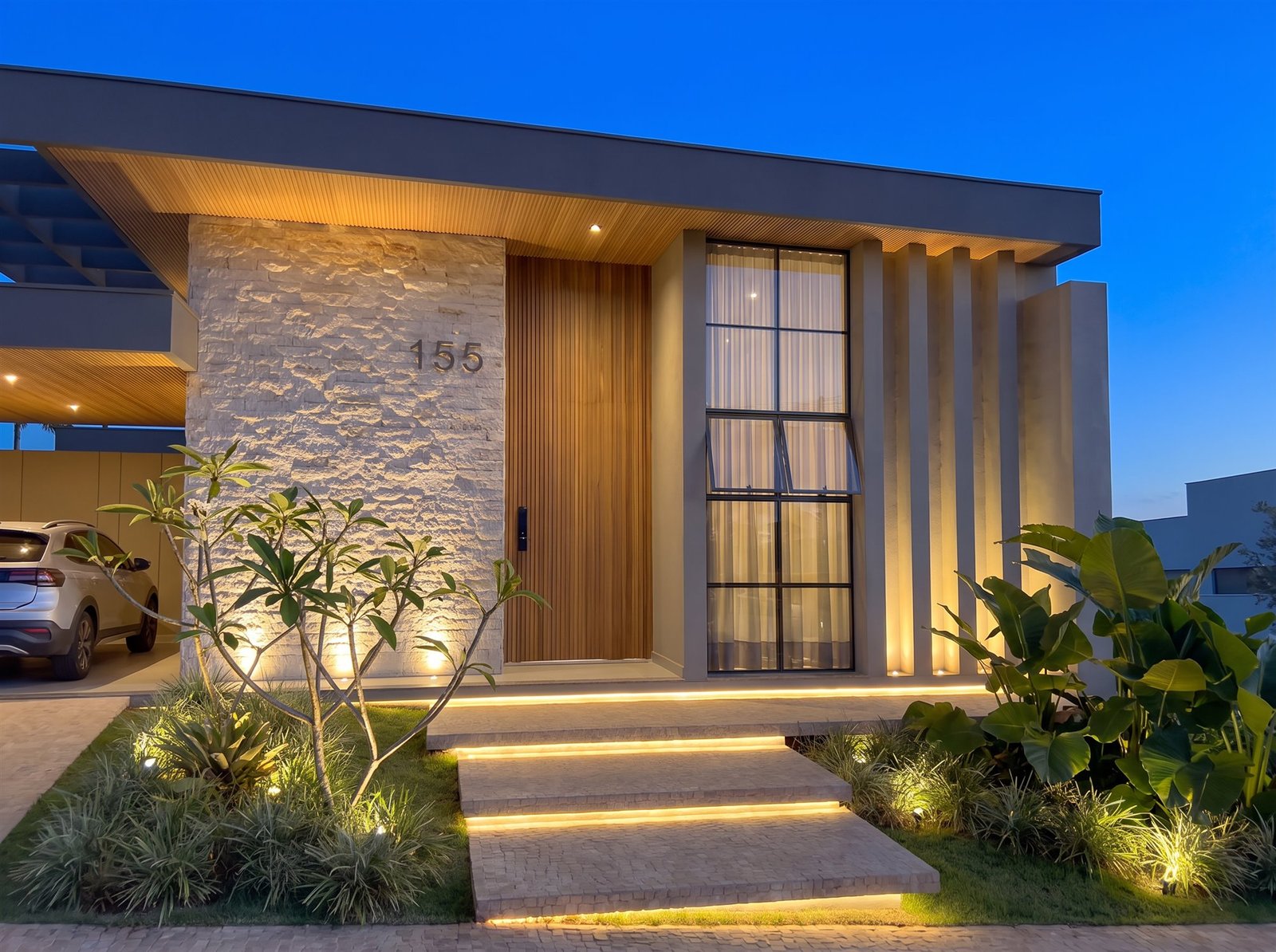 Casa RP — Adamantina: fachada noturna iluminada — projeto de arquitetura residencial